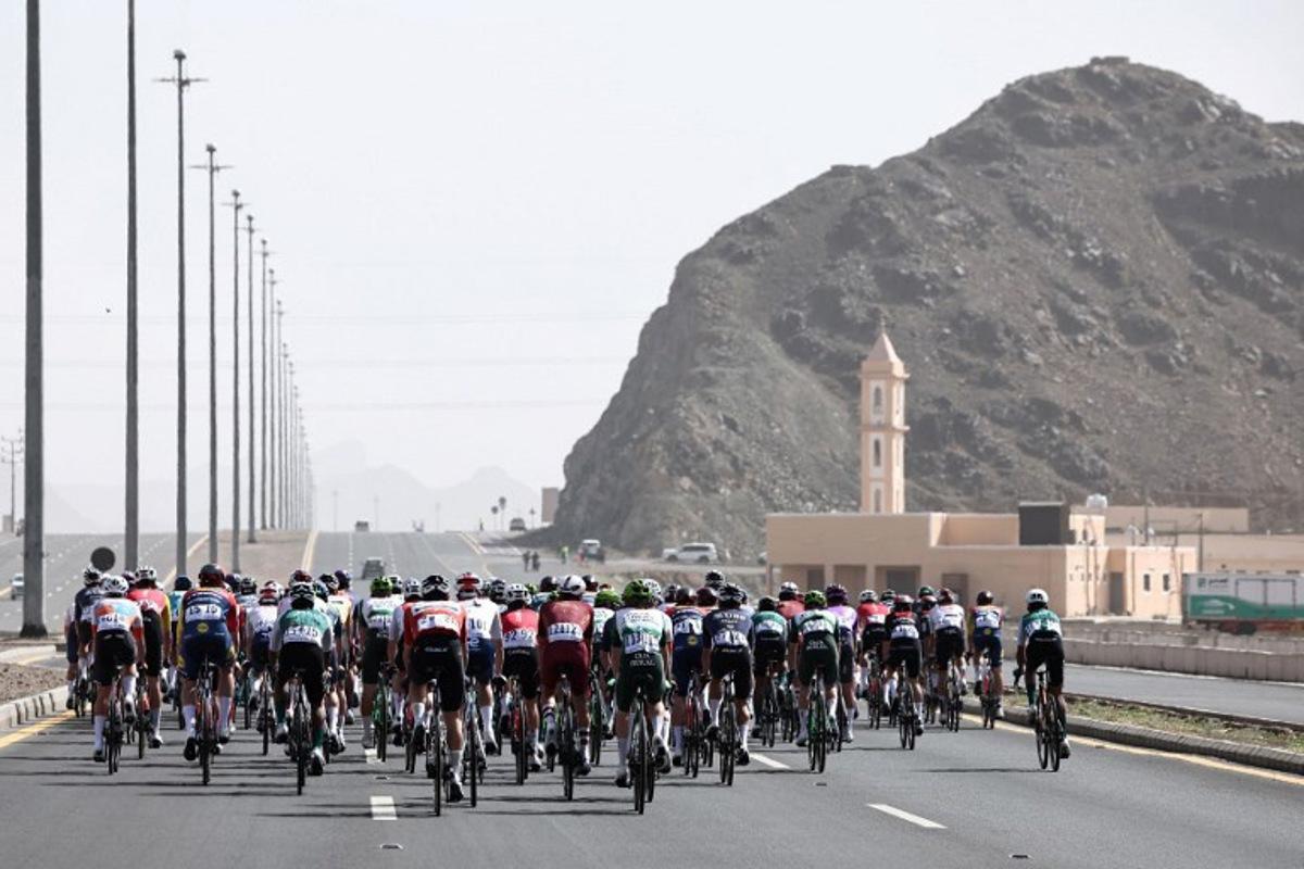 The pack rides during the third stage of the AlUla Tour cycling race, 142.1km from Winter Park to Bir Jaydah Mountain Wirkah on January 29, 2026.  Anne-Christine POUJOULAT / AFP