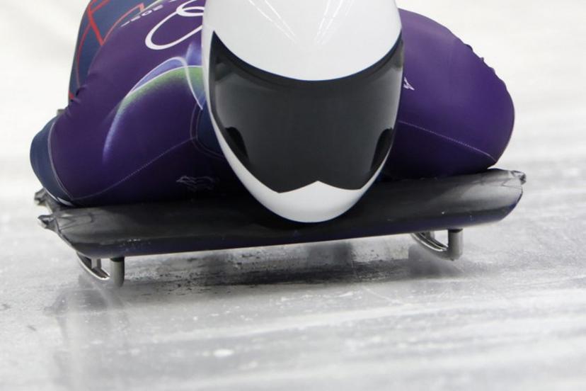 Britain's Matt Weston competes in the skeleton men's heat 1 at Cortina Sliding Centre during the Milano Cortina 2026 Winter Olympic Games in Cortina d'Ampezzo on February 12, 2026.  Odd ANDERSEN / AFP