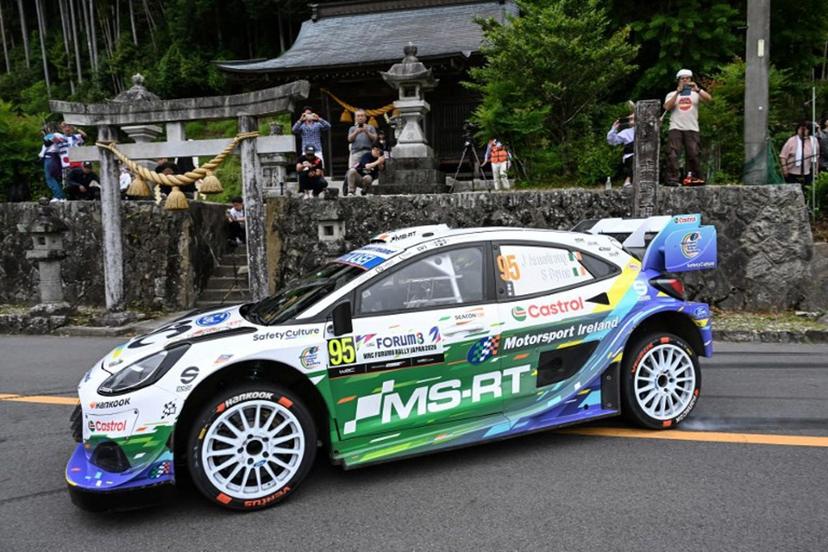 Jon Armstrong of Ireland and his co-driver Shane Byrne of Ireland drive their Ford Puma Rally1 during the SS16 Lake Mikawako section of the Rally Japan, the 7th round of FIA World Rally Championships, in Toyota city, Aichi prefecture on May 31, 2026.  Toshifumi KITAMURA / AFP