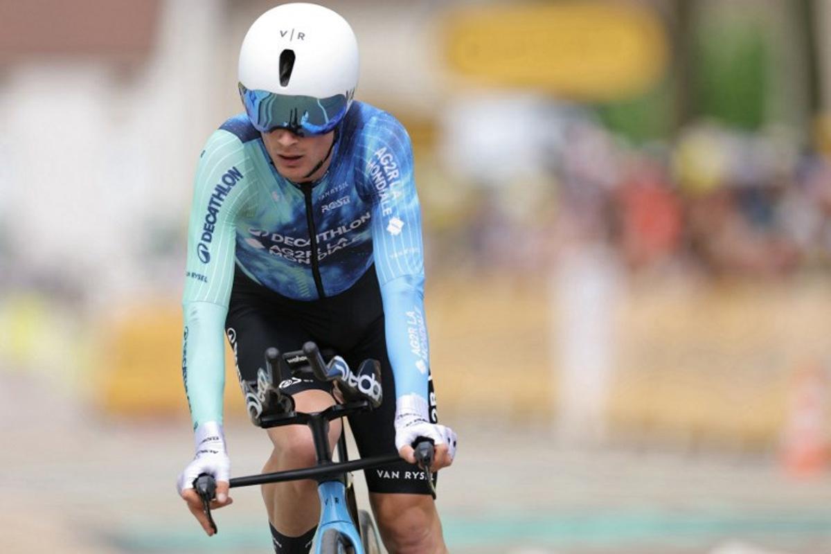 Decathlon AG2R La Mondiale Team's French rider Nicolas Prodhomme cycles past the finish line of the 7th stage of the 111th edition of the Tour de France cycling race, 25,3 km individual time trial between Nuits-Saint-Georges and Gevrey-Chambertin, on July 5, 2024.  Thomas SAMSON / AFP