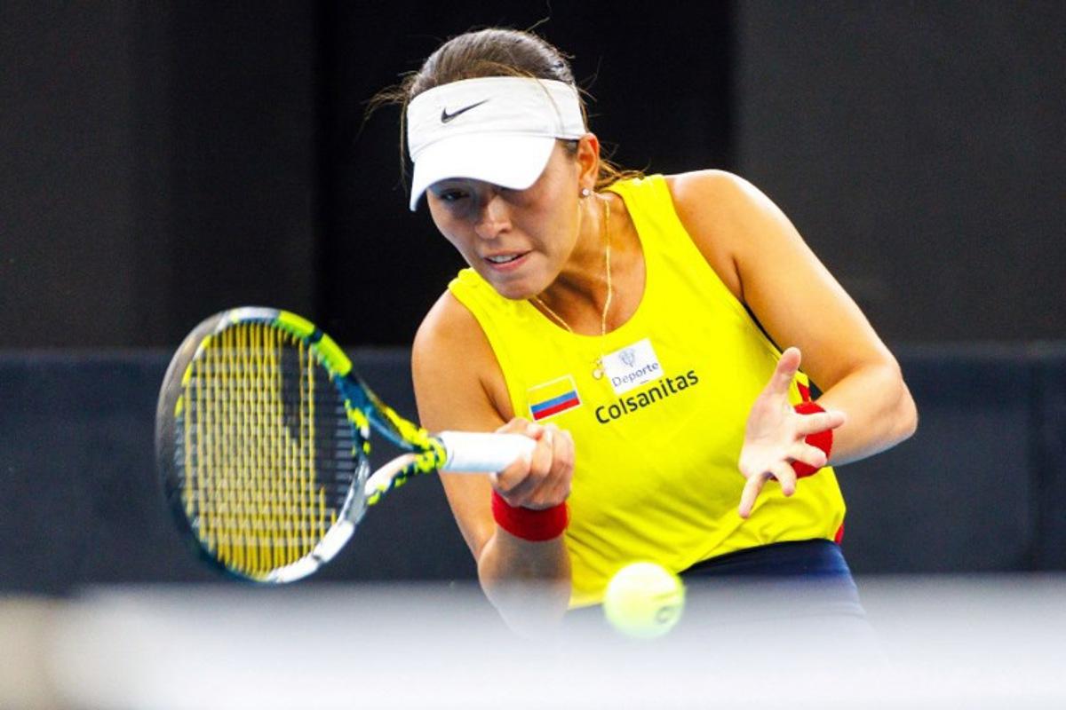Colombia's Yuliana Monroy hits a return against Australia's Maya Joint during their women's singles match at the Billie Jean King Cup in Brisbane on April 12, 2025.  Patrick HAMILTON / AFP