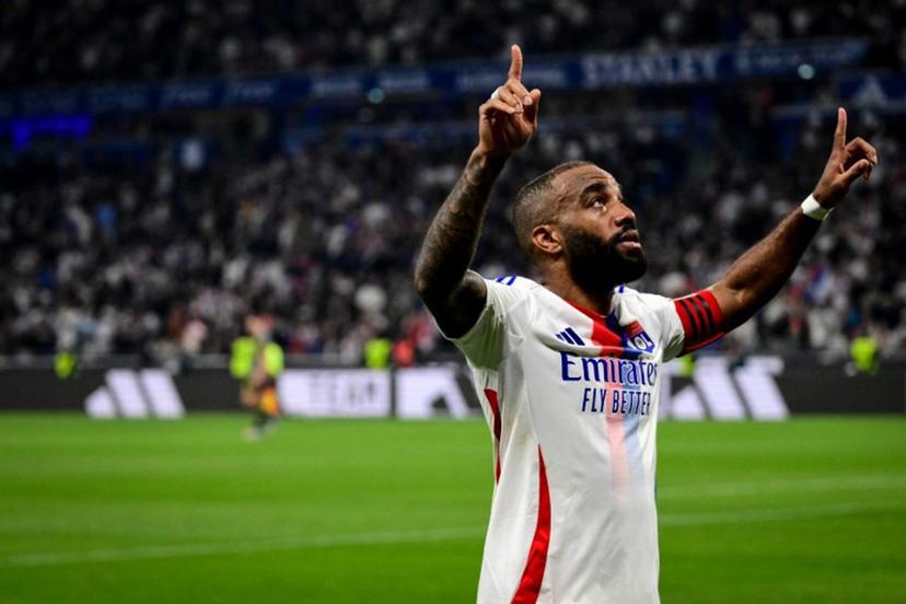 Lyon's French forward #10 Alexandre Lacazette celebrates after scoring a goal during the French L1 football match between Olympique Lyonnais (OL) and LOSC (Lille) at the Parc Olympique Lyonnais Groupama stadium in Decines-Charpieu, central-eastern France on April 5, 2025.  OLIVIER CHASSIGNOLE / AFP