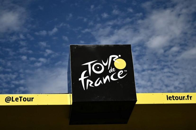 The Tour de France logo adorns the podium at the finish line of the 12th stage of the 111th edition of the Tour de France cycling race, 203,6 km between Aurillac and Villeneuve-sur-Lot, southwestern France, on July 11, 2024.  Marco BERTORELLO / AFP