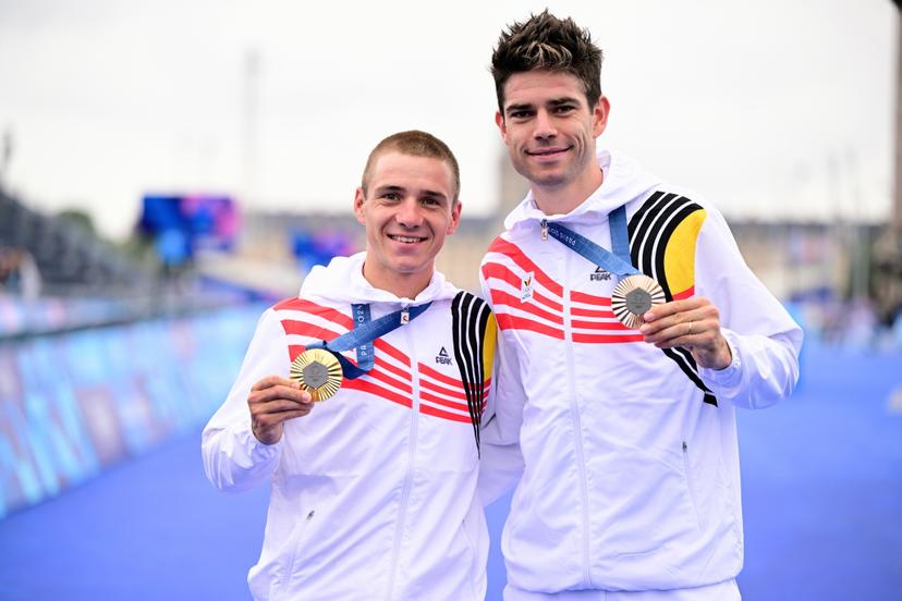 Belgian gold medallist Remco Evenepoel and Belgian bronze medallist Wout van Aert pose after the podium ceremony of the men's time trial event at the Paris 2024 Olympic Games, on Saturday 27 July 2024 in Paris, France . The Games of the XXXIII Olympiad are taking place in Paris from 26 July to 11 August. The Belgian delegation counts 165 athletes in 21 sports. BELGA PHOTO LAURIE DIEFFEMBACQ