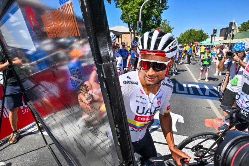 UAE Team Emirates XRG rider Jhonatan Narváez from Ecuador signs on prior to stage one of the Tour Down Under UCI Men's Cycling race in Adelaide on January 21, 2026.  Brenton Edwards / AFP