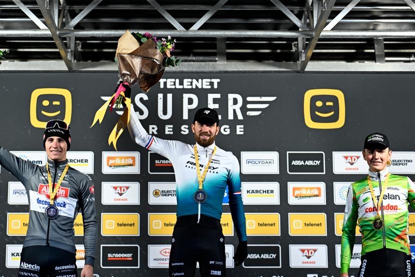 Belgian Niels Vandeputte, Dutch Joris Nieuwenhuis and Belgian Emiel Verstrynge celebrate on the podium after the men's race of the Superprestige Merksplas cyclocross event, fourth stage (4/8) of the Superprestige cyclocross cycling competition, Saturday 15 November 2025, in Merksplas. BELGA PHOTO JASPER JACOBS