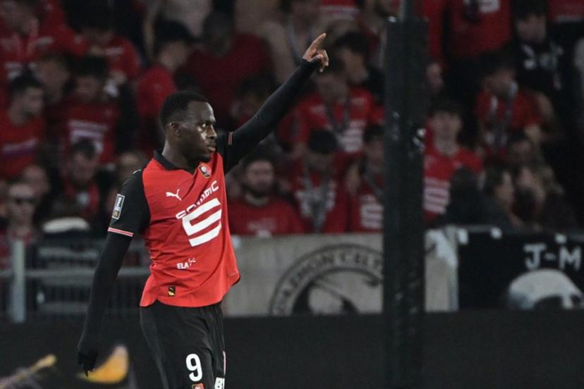 Rennes' French forward #09 Arnaud Kalimuendo celebrates after scoring  during the French L1 football match between Stade Rennais FC and OGC Nice at Roazhon Park stadium in Rennes, western France on May 10, 2025.  DAMIEN MEYER / AFP