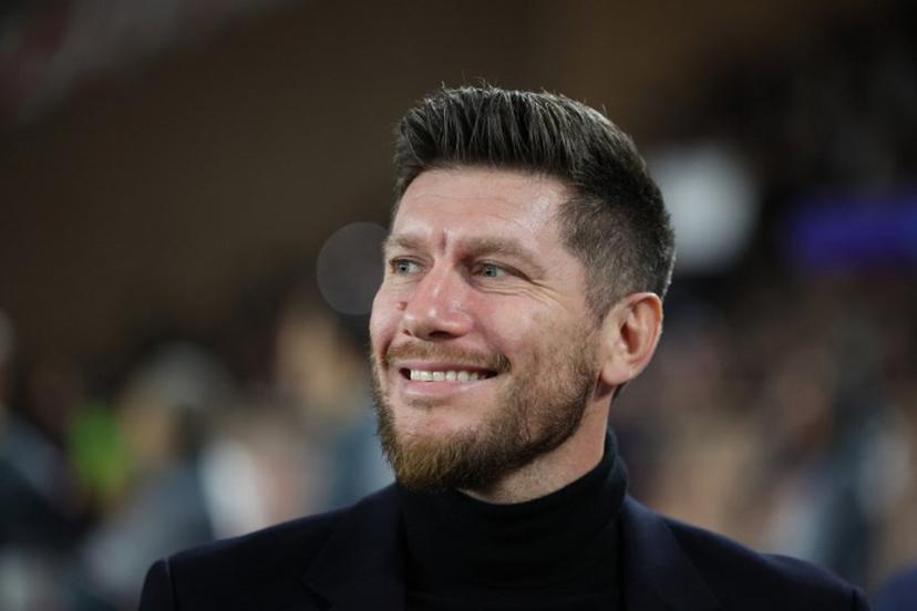 Monaco's Belgian head coach Sebastien Pocognoli looks on before the start of the UEFA Champions League knockout round play-off first leg football match between AS Monaco and Paris Saint-Germain at Stade Louis II in the Principality of Monaco on February 17, 2026.  Valery HACHE / AFP