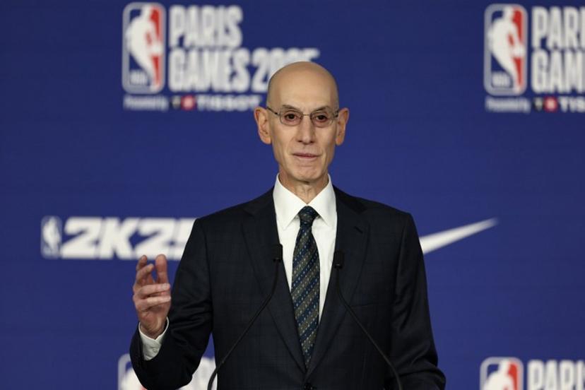NBA commissioner Adam Silver delivers remarks during a press conference prior to the NBA basketball game between the Indiana Pacers and the San Antonio Spurs at the Accor Arena - Palais Omnisports de Paris-Bercy - in Paris on January 23, 2025.  FRANCK FIFE / AFP