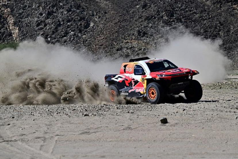 Toyota Gazoo Racing W2RC US' driver Seth Quintero and US' co-driver Andrew Shorts compete in the prologue, which determines the starting line-up for the first stage of the 48th edition of the Dakar Rally 2026, between Yanbu and Yanbu, Saudi Arabia, on January 3, 2026.  Giuseppe CACACE / AFP