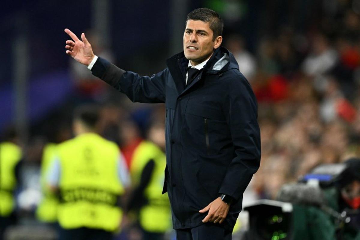 Portugal's head coach Francisco Neto gestures from the techincal area during the UEFA Women's Euro 2025 Group B football match between Portugal and Italy at the Stade de Geneve in Geneva, on July 7, 2025.  Fabrice COFFRINI / AFP