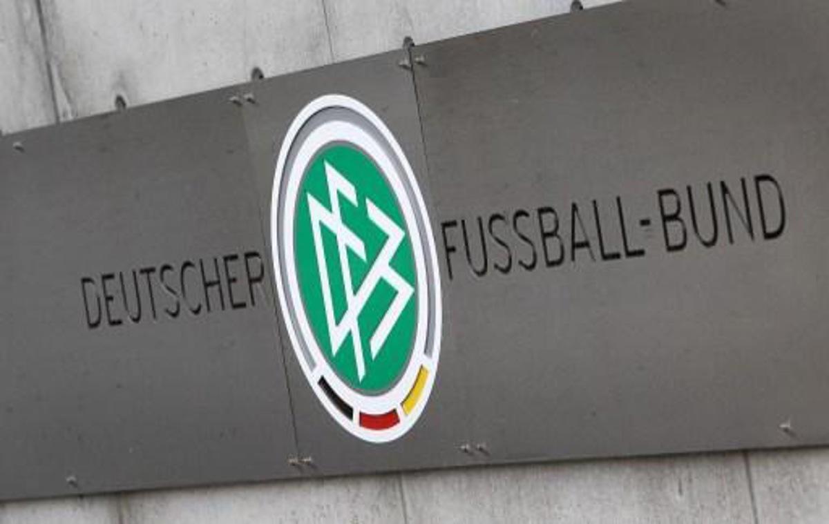 A logo is pictured at the headquarters of the German Football Federation (DFB) in Frankfurt am Main, western Germany, on November 3, 2015. Police raided offices of the German Football Federation (DFB) and homes of top officials over tax evasion allegations, as a scandal surrounding graft claims over the awarding of the 2006 World Cup widened.   AFP PHOTO / DANIEL ROLAND