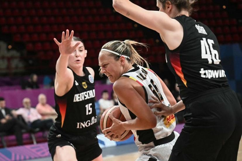 Belgium's point guard Julie Allemand (C) is defended by Germany's centre Luisa Geiselsoder (L) and Germany's small forward Romy Bar during the FIBA Women's EuroBasket 2025 quarter-final match between Belgium and Germany at the Peace and Friendship Stadium in Piraeus near Athens on June 25, 2025.  Angelos Tzortzinis / AFP