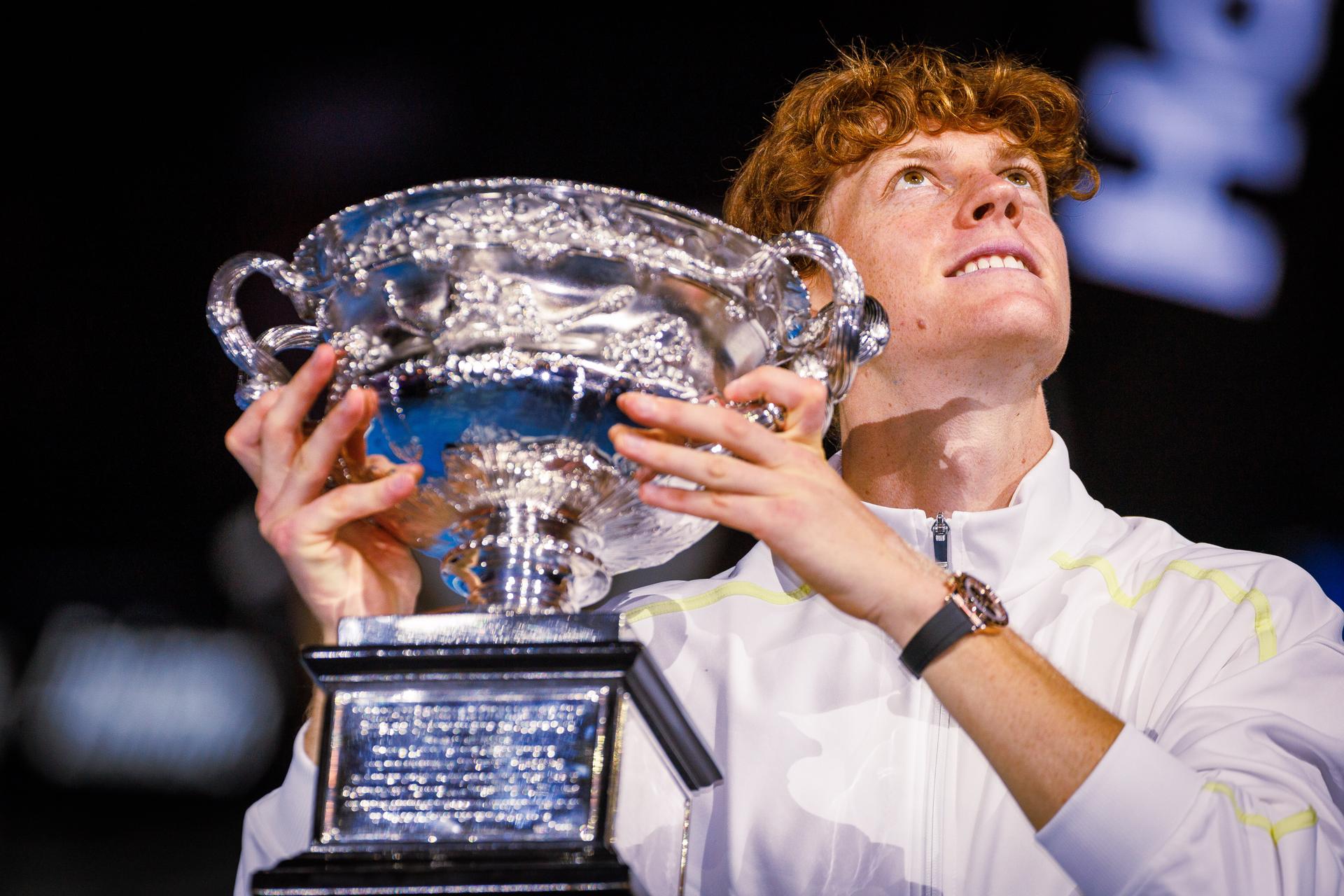 Italian Jannik Sinner celebrates with the trophy after winning a tennis match between Italian Sinner and German Zverez, the final of the men's singles at the 'Australian Open' Grand Slam tennis tournament, Sunday 26 January 2025 in Melbourne Park, Melbourne, Australia. The 2025 edition of the Australian Grand Slam takes place from January 12th to January 26th. BELGA PHOTO PATRICK HAMILTON