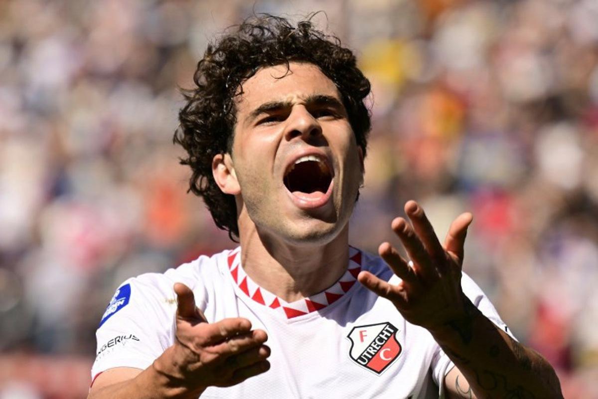 Utrecht's Spanish defender #22 Miguel Rodriguez celebrates after scoring his team's second goal during the Dutch Eredivisie football match between FC Utrecht and AFC Ajax at the Galgenwaard Stadium, in Utrecht on April 20, 2025.  Olaf Kraak / ANP / AFP