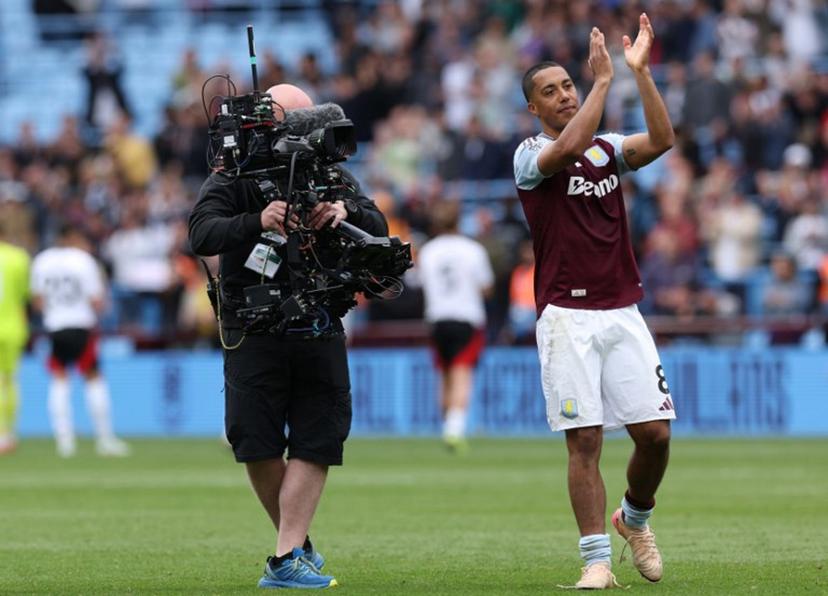 Aston Villa's Belgian midfielder #08 Youri Tielemans (R) applauds fans on the pitch after the English Premier League football match between Aston Villa and Fulham at Villa Park in Birmingham, central England on May 3, 2025. Villa won the game 1-0. Adrian Dennis / AFP
