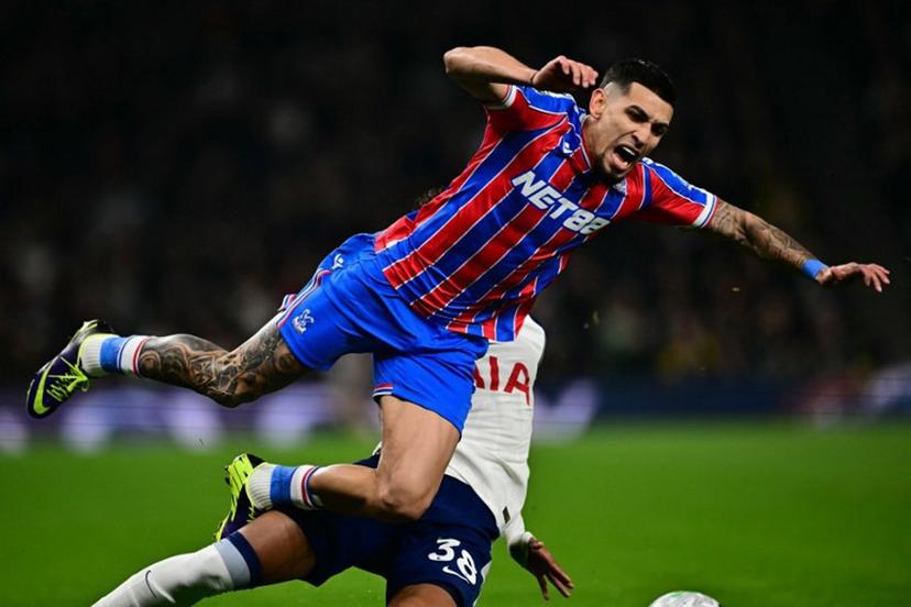 Crystal Palace's Colombian defender #02 Daniel Munoz is tackled by Tottenham Hotspur's Brazilian defender #38 Joao Victor de Souza Menezes during the English Premier League football match between Tottenham Hotspur and Crystal Palace at the Tottenham Hotspur Stadium in London, on March 5, 2026.  Ben STANSALL / AFP