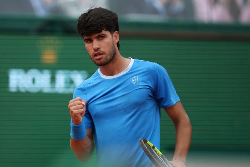 Spain's Carlos Alcaraz reacts as he plays against Italy's Jannik Sinner during the Monte Carlo ATP Masters Series Tournament final tennis match on Court Rainier III at the Monte-Carlo Country Club in Roquebrune-Cap-Martin, south-eastern France on April 12, 2026.  Valery HACHE / AFP