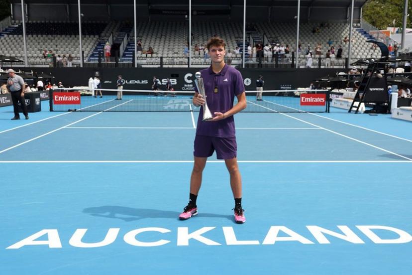 Czech Republic's Jakub Mensik poses with his trophy after victory against Argentina's Sebastian Baez in their men's singles final match at the ATP Auckland Classic tennis tournament in Auckland on January 17, 2026.  Michael Bradley / AFP