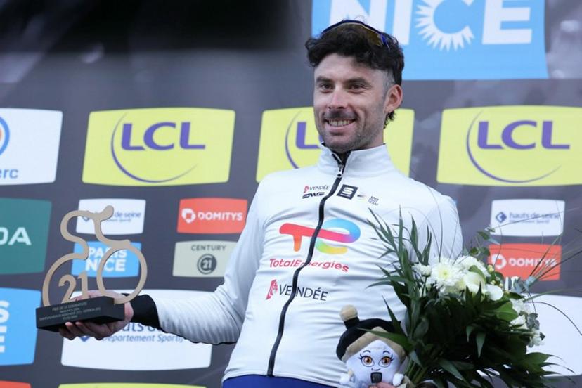 TotalEnergies' French cyclist Pierre Latour celebrates his combativity award on the podium after the 5th stage of the Paris-Nice cycling race, 193,5 km between Saint-Sauveur-de-Montagut and Sisteron, on March 7, 2024.  Thomas SAMSON / AFP