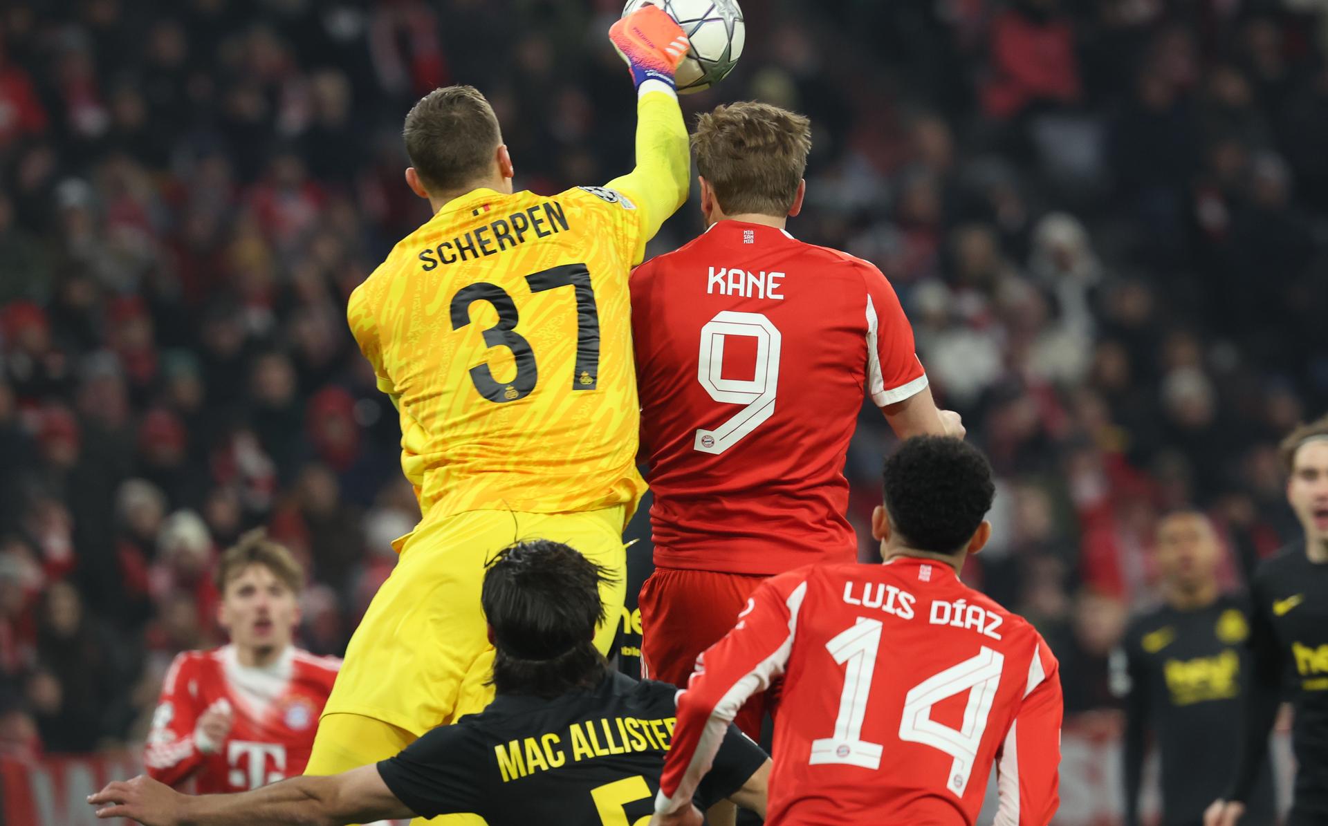 Union's goalkeeper Kjell Scherpen and Bayern's Harry Kane fight for the ball during a soccer game between German FC Bayern Munich and Belgian Royale Union Saint-Gilloise, on Wednesday 21 January 2026 in Munich, on the seventh day of the League phase of the UEFA Champions League tournament. BELGA PHOTO VIRGINIE LEFOUR
