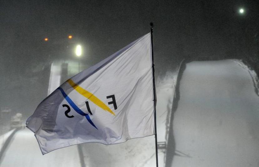 This picture taken on December 2010 at the Harrachov's ski jump hill shows a flag of International Ski Federation (FIS) blowing in the wind as the FIS Ski Jumping World Cup has been delayed due to a strong wind.  AFP PHOTO/MICHAL CIZEK  Michal CIZEK / AFP