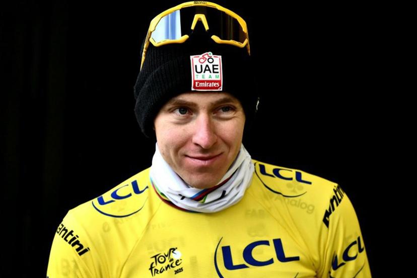 UAE Team Emirates - XRG team's Slovenian rider Tadej Pogacar celebrates on the podium with the overall leader's yellow jersey after the 20th stage of the 112th edition of the Tour de France cycling race, 184.2 km between Nantua and Pontarlier, in the Jura, eastern France, on July 26, 2025.  Marco BERTORELLO / AFP