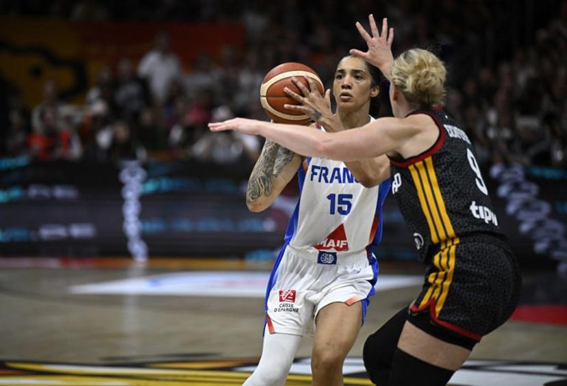 France's forward #15 Gabby Williams (L) and Germany's small forward #09 Emma Eichmeyer vie for the ball during the 2026 FIBA Women's Basketball World Cup semi-final match between France and Germany in Berlin on September 12, 2026.  Tobias SCHWARZ / AFP