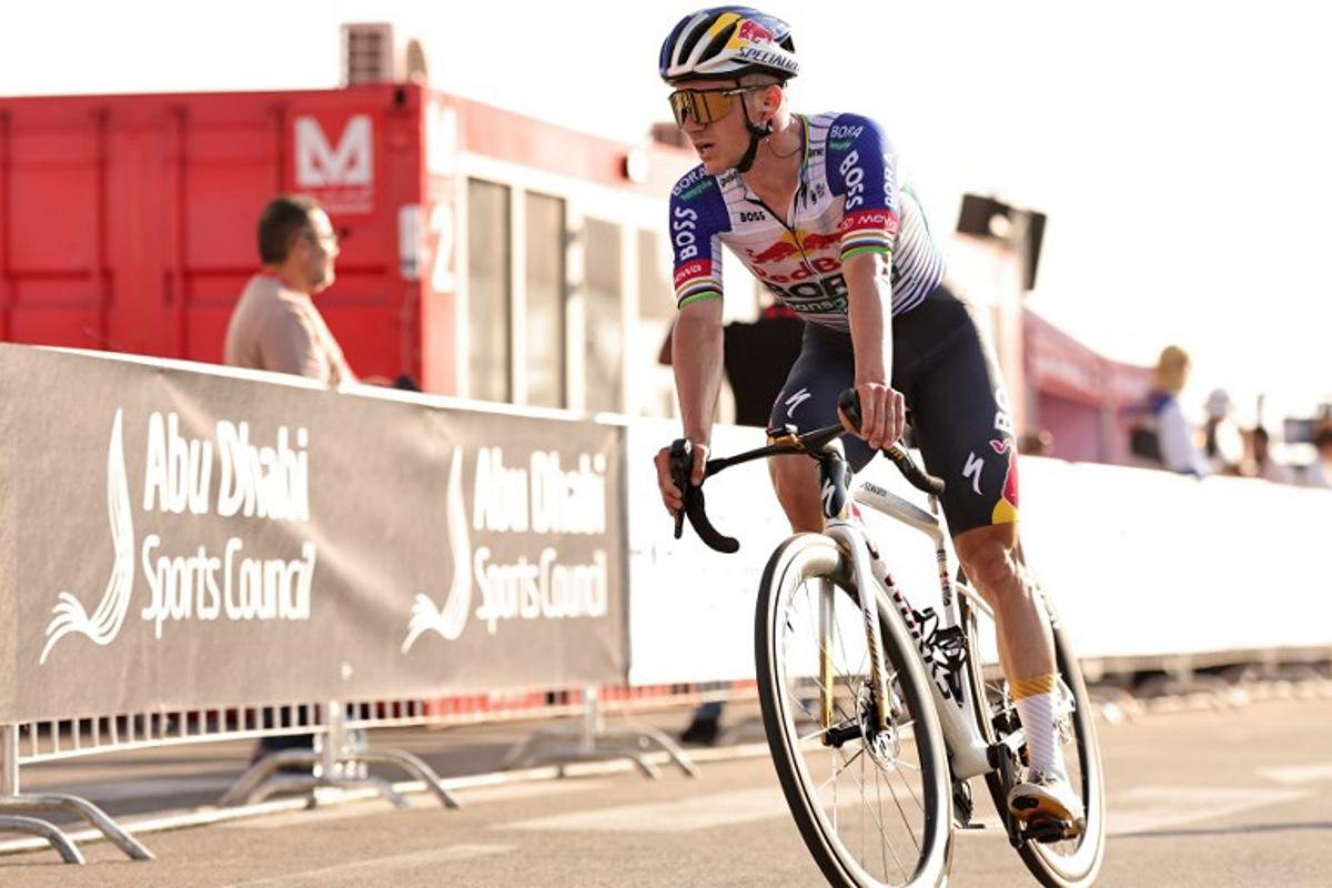 Red Bull-Bora-Hansgrohe's Belgian rider Remco Evenepoel reacts after finishing the sixth stage of the UAE Tour cycling event from al-Ain Museum to Jebel Hafeet in Abu Dhabi on February 21, 2026.  Fadel SENNA / AFP