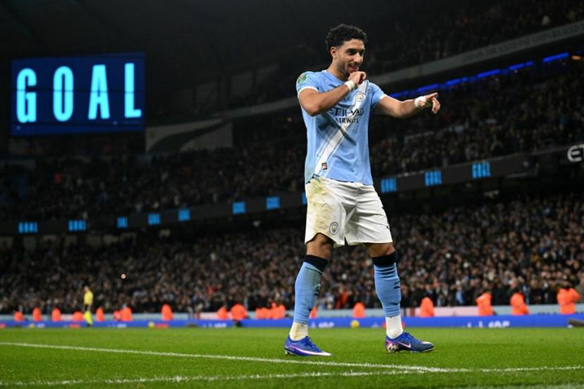 Manchester City's Egyptian striker #07 Omar Marmoush celebrates scoring the team's second goal during the English League Cup semi final second leg football match between Manchester City and Newcastle United at the Etihad stadium in Manchester, northwest England on February 4, 2026.  Oli SCARFF / AFP