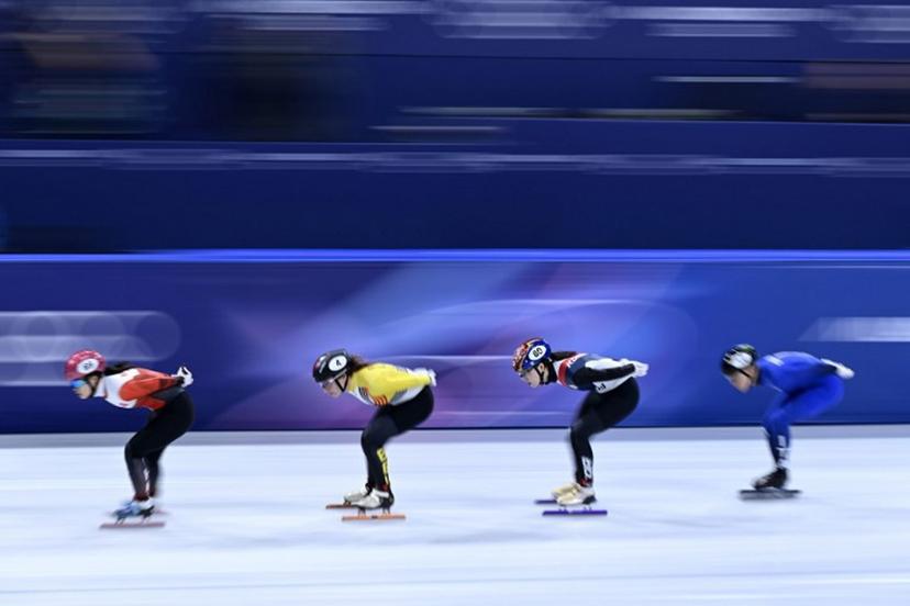 (L-R) Hong Kong's Lam Ching Yan, Belgium's Hanne Desmet, South Korea's Noh Do-hee and Italy's Arianna Fontana compete in the short track speed skating women's 1500m quarter-final during the Milano Cortina 2026 Winter Olympic Games at Milano Ice Skating Arena in Milan on February 20, 2026.  WANG Zhao / AFP