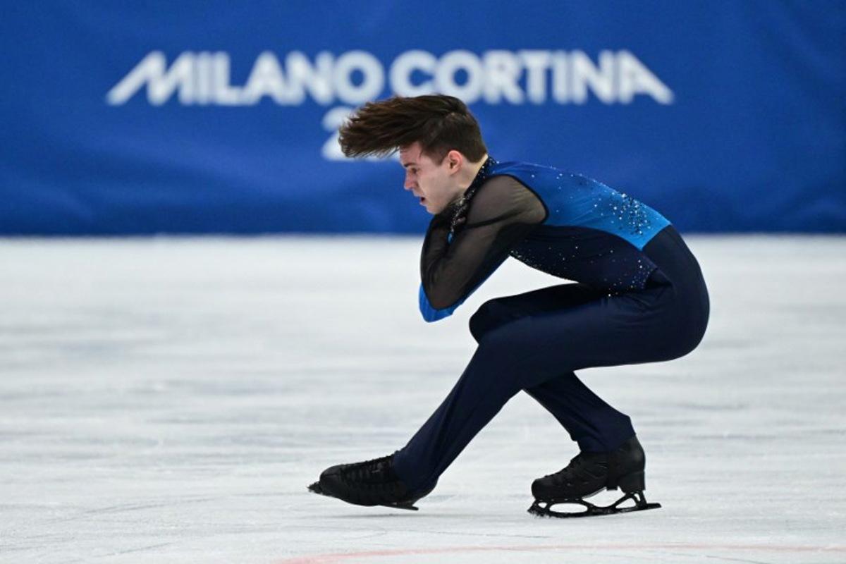 Kazakhstan's Mikhail Shaidorov competes in the figure skating men's singles free skating final during the Milano Cortina 2026 Winter Olympic Games at Milano Ice Skating Arena in Milan on February 13, 2026.  Piero CRUCIATTI / AFP