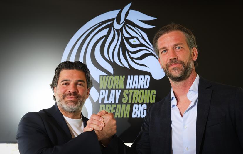 Charleroi's general administrator Mehdi Bayat and Charleroi's head coach Rik De Mil pose for the photographer at a press conference of Belgian soccer club Sporting Charleroi, on Monday 26 May 2025, in Charleroi. BELGA PHOTO VIRGINIE LEFOUR