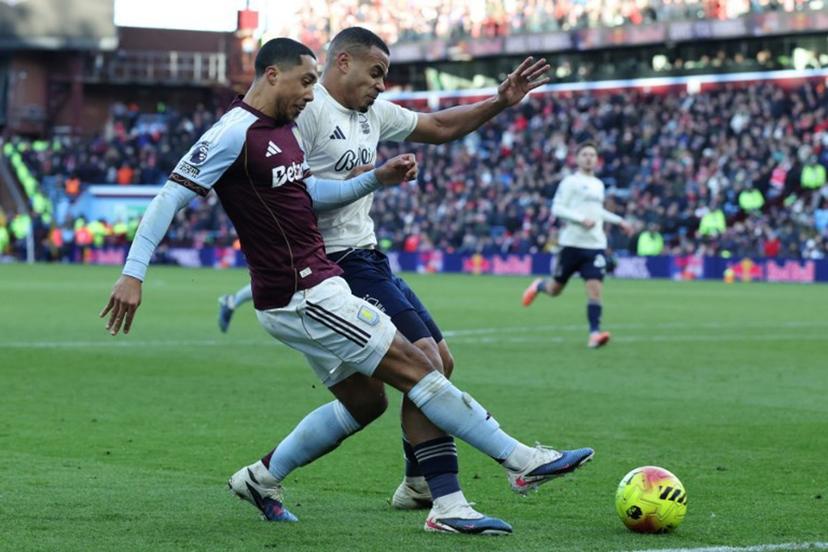 Aston Villa's Belgian midfielder  #08 Youri Tielemans (L) vies with Nottingham Forest's Brazilian defender #05 Murillo (R) during the English Premier League football match between Aston Villa and Nottingham Forest at Villa Park in Birmingham, central England on January 3, 2026.  Darren Staples / AFP