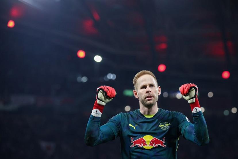 Leipzig's Hungarian goalkeeper #01 Peter Gulacsi celebrates after the German first division Bundesliga football match between RB Leipzig and Borussia Dortmund in Leipzig, eastern Germany on March 15, 2025.  Ronny Hartmann / AFP