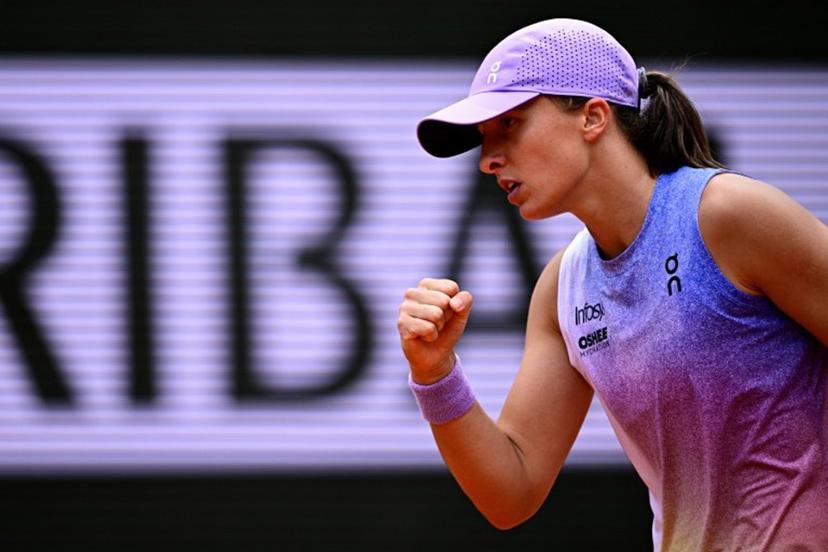 Poland's Iga Swiatek reacts to a point against Kazakhstan's Elena Rybakina during their women's singles match on day 8 of the French Open tennis tournament on Court Philippe-Chatrier at the Roland-Garros Complex in Paris on June 1, 2025.  JULIEN DE ROSA / AFP