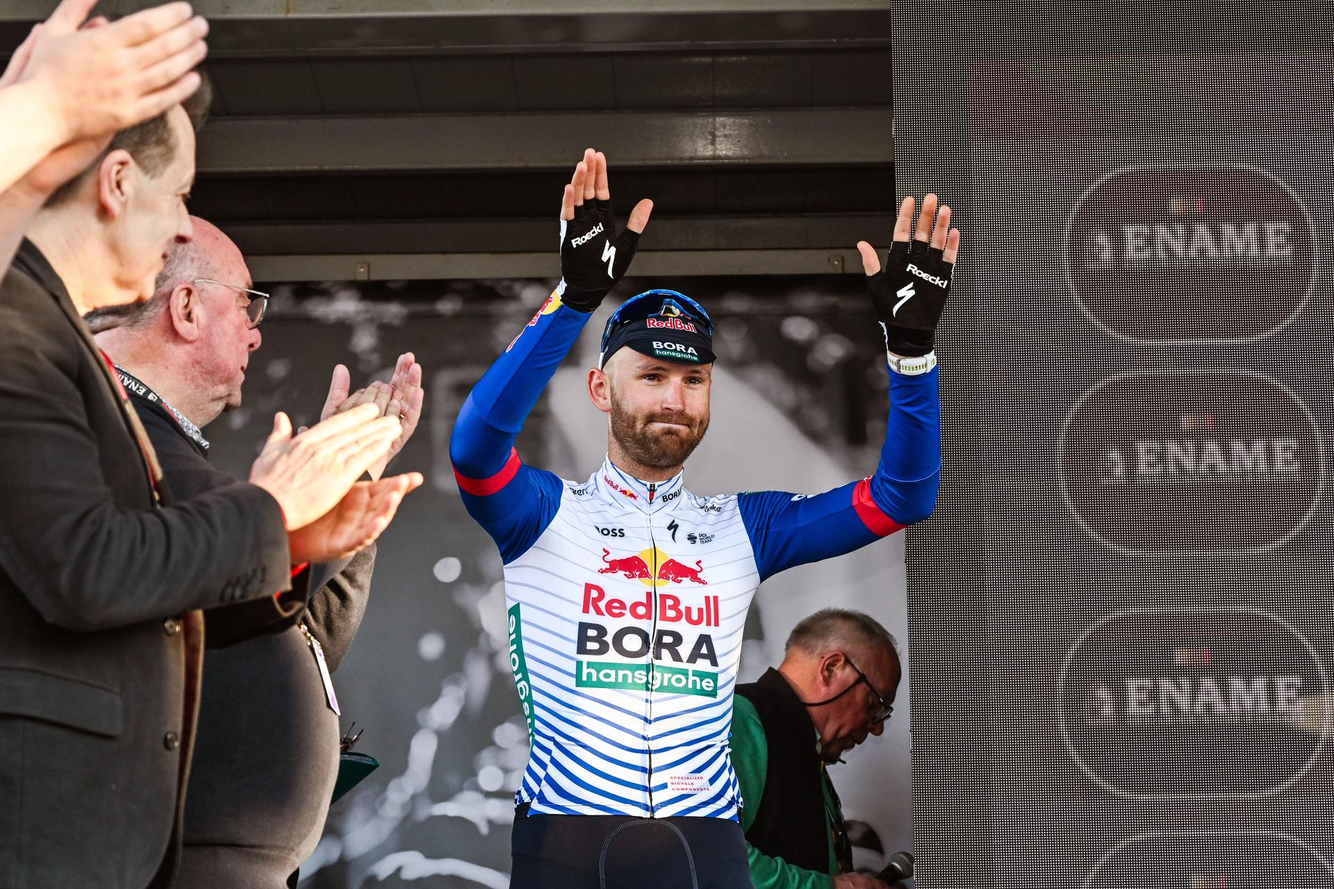 Belgian Jordi Meeus of Red Bull-BORA-hansgrohe celebrates on the podium after winning the 'Ename Samyn Classic' one day cycling race, 203,8km from Quaregnon to Dour on Tuesday 03 March 2026. BELGA PHOTO MAARTEN STRAETEMANS