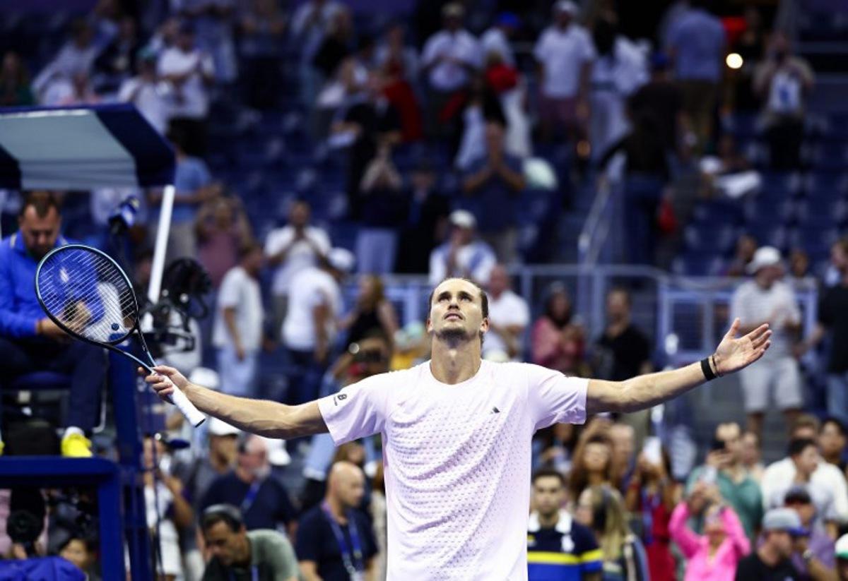 Germany's Alexander Zverev celebrates after defeating Italy's Lorenzo Sonego during the men's singles first-round tennis match on day three of the US Open tennis tournament at the USTA Billie Jean King National Tennis Center in New York City in the early hours of September 2, 2026.  CHARLY TRIBALLEAU / AFP