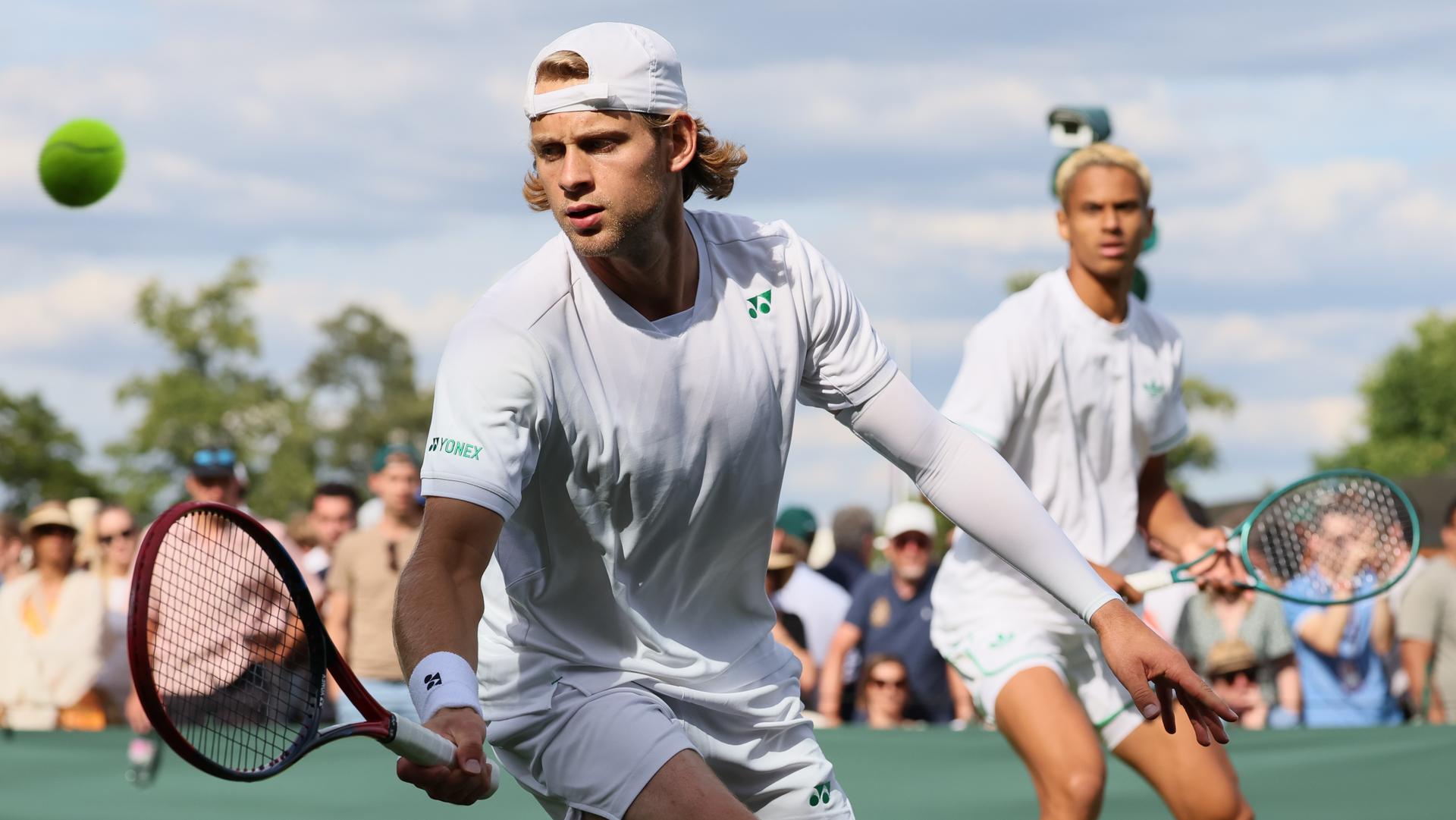 Belgian Zizou Bergs pictured in action during a doubles tennis match between French pair Doumbia-Reboul and Belgian-Canadian pair Bergs-Diallo, in the first round of the men's doubles at the 2025 Wimbledon grand slam tournament, Thursday 03 July 2025 at the All England Tennis Club, in South-West London, Britain. BELGA PHOTO BENOIT DOPPAGNE