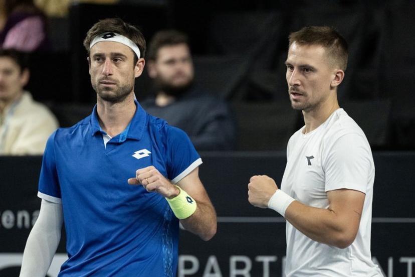 Belgium's Sander Gille (L) and Poland's Jan Zielinski (R) react during their men's doubles final tennis match against France's Benjamin Bonzi and France's Pierre-Hughes Herbert at the Marseille Open 13 ATP World Tour in Marseille, southern France on February 16, 2025.  MIGUEL MEDINA / AFP