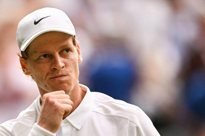 Italy's Jannik Sinner reacts after winning a game against Spain's Carlos Alcaraz during their men's singles final tennis match on the fourteenth day of the 2025 Wimbledon Championships at The All England Lawn Tennis and Croquet Club in Wimbledon, southwest London, on July 13, 2025.  Kirill KUDRYAVTSEV / AFP
