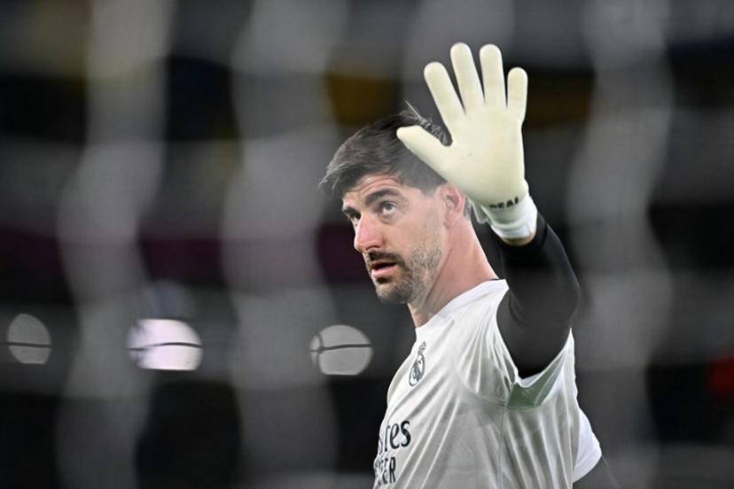 Real Madrid's Belgian goalkeeper #01 Thibaut Courtois warms up before the UEFA Champions Leaugue - 1st round day 2 football match between AS Roma and Real Madrid at the Olympic Stadium in Rome on October 14, 2026.  Filippo MONTEFORTE / AFP