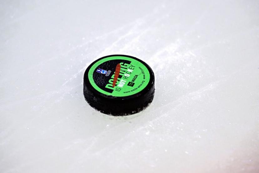 The puck is pictured during the IIHF Men's Ice Hockey World Championship final match between Switzerland and USA in Stockholm, on May 25, 2025.  Magnus LEJHALL / TT NEWS AGENCY / AFP