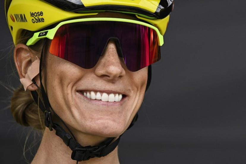 Team Visma | Lease a Bike's French rider Pauline Ferrand-Prevot smiles as she awaits the start of the 5th stage (out of 9) of the fourth edition of the Women's Tour de France cycling race, 165.8 km from Chasseneuil-du-Poitou to Gueret, central France on July 30, 2025.  JULIEN DE ROSA / AFP