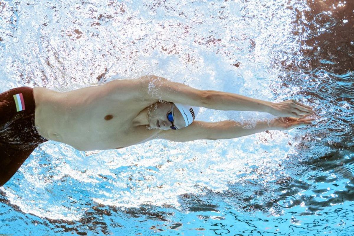 Hungary's swimmer Hubert Kos competes in a semi-final of the men's 200m individual medley swimming event during the 2025 World Aquatics Championships in Singapore on July 30, 2025.  François-Xavier MARIT / AFP