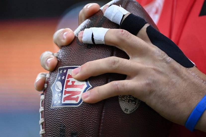 Kansas City Chiefs quarterback Patrick Mahomes warms up with the ball prior to the NFL game between Miami Dolphins and Kansas City Chiefs at the Waldstadion in Frankfurt am Main, western Germany on November 5, 2023.  Kirill KUDRYAVTSEV / AFP