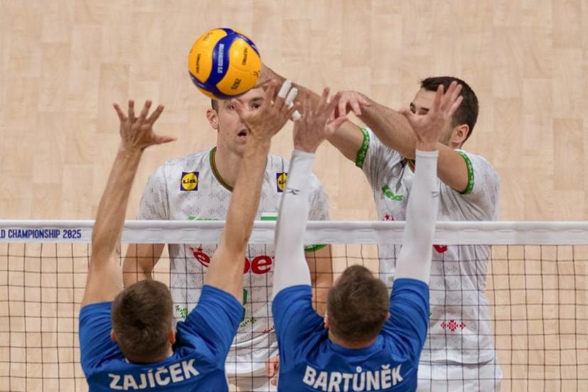 Bulgaria's Martin Atanasov (back R) spikes the ball against Czech Republic's Adam Zajicek and Lubos Bartunek during the 2025 Men's Volleyball World Championship semi-final match at the Mall of Asia Arena in Pasay City, Metro Manila on September 27, 2025.  Ted ALJIBE / AFP