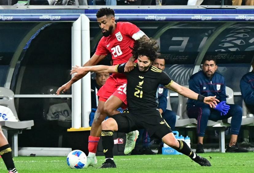 Panama's midfielder #20 Anibal Godoy and Mexico's forward #21 Cesar Huerta vie for the ball during the CONCACAF Nations League final football match between Mexico and Panama at SoFi Stadium in Inglewood, California, on March 23, 2025.  Frederic J. Brown / AFP