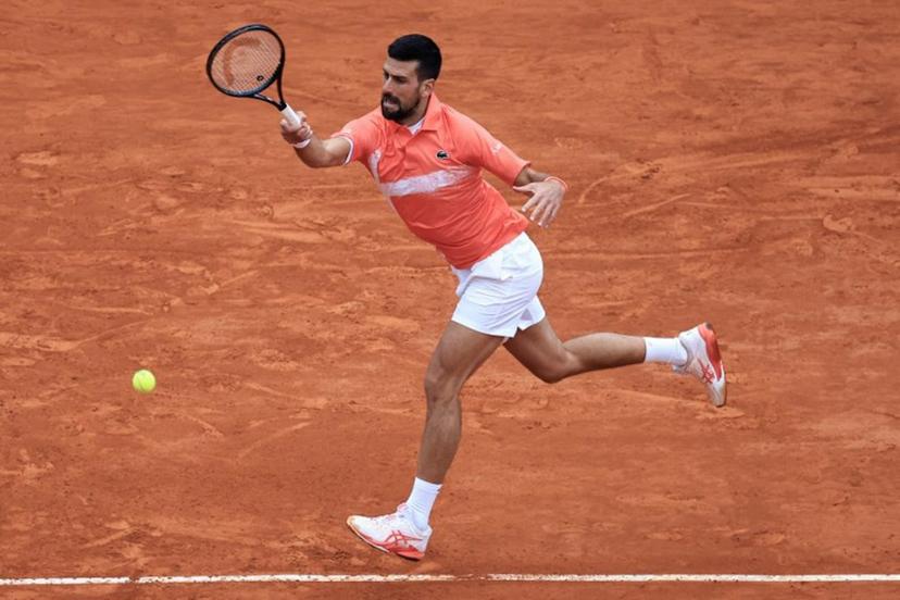 Serbia's Novak Djokovic plays a forehand return to Chile's Alejandro Tabilo during the Monte Carlo ATP Masters Series Tournament round of 32 tennis match on the Ranier III court at the Monte Carlo Country Club in  Roquebrune-Cap-Martin on April 9, 2025.  Valery HACHE / AFP
