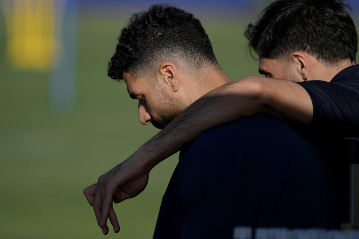 Iran's forward #09 Mehdi Taremi (L) and Iran's midfielder #07 Alireza Jahanbakhsh are seen during a training session at Centro Xoloitzcuintle in Tijuana, on June 22, 2026, during the 2026 World Cup football tournament.   Guillermo Arias / AFP